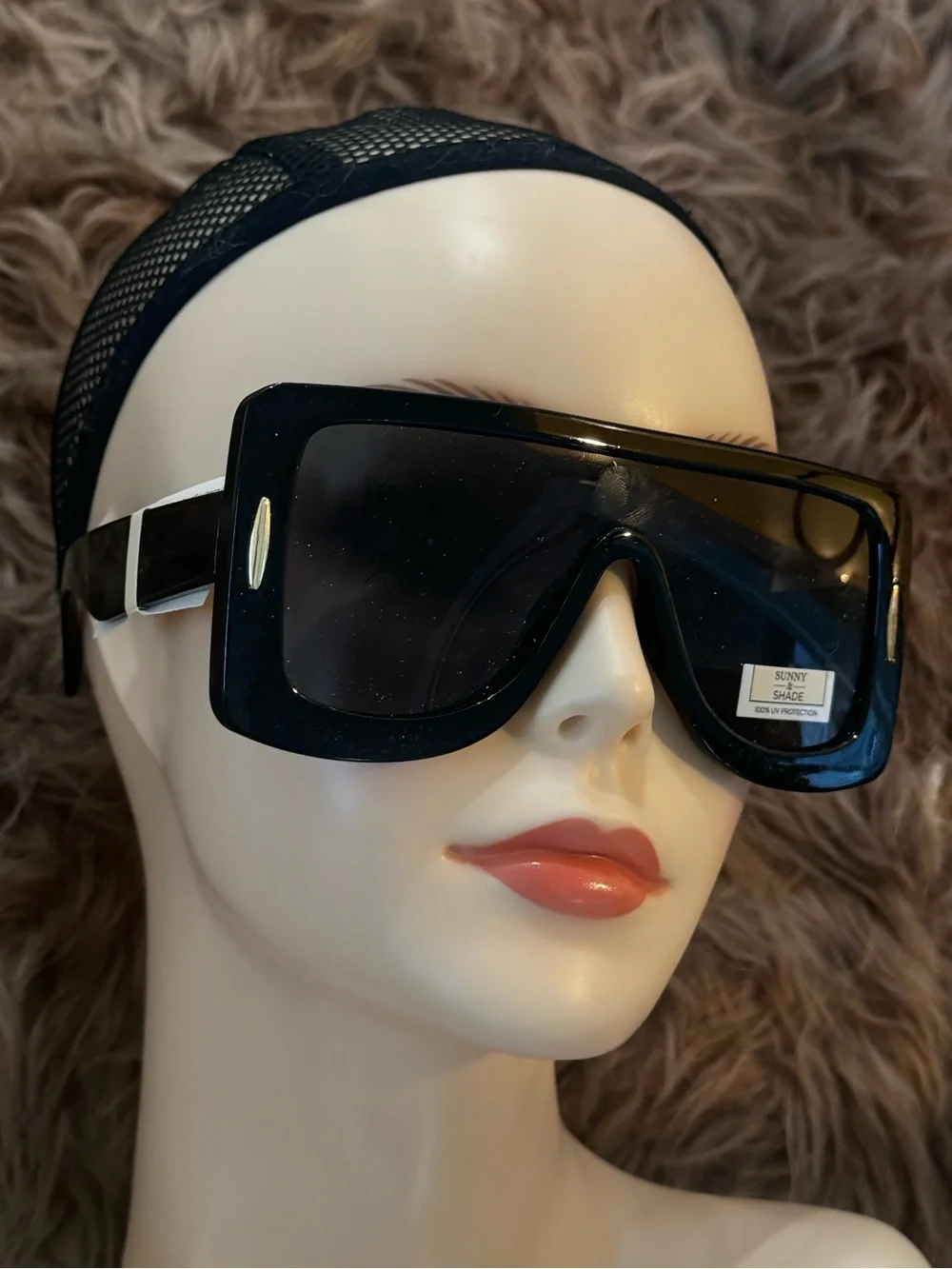 Futuristic sunglasses with gold details